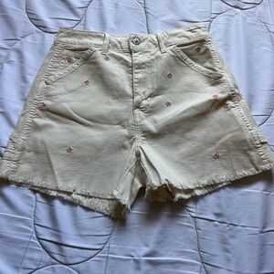 Cream shorts with floral embroidery